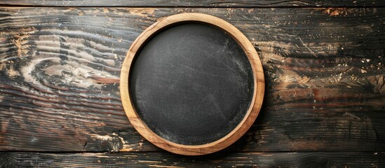 Wooden plate with small blackboard for copy space image.