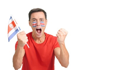 Man cheering for Costa Rica screaming and waving a national flag