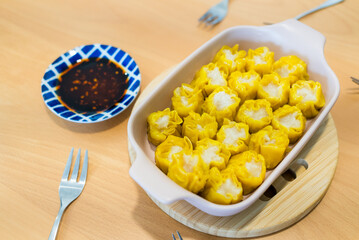 Hong Kong famous street food siu mai fish dumpling with spicy oil