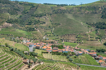Em meio a montanhas e uma zona rural coberta por vinha, uma pequena aldeia em Trás os Montes,...