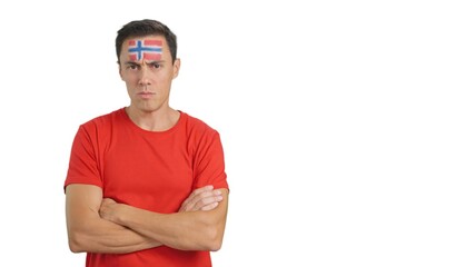 Fototapeta premium Dignified and serious man with norwegian flag painted on face