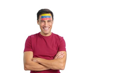 Man standing with venezuelan flag painted on face smiling
