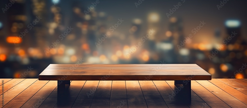 Poster Nighttime empty coffee table with a blurred background highlighting a space for an image. with copy space image. Place for adding text or design