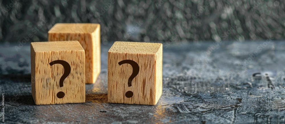 Aufkleber three wooden blocks with a question mark, set against a dark background with copy space image.