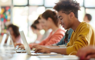 Diverse College Students Engaged in Technology-Enhanced Learning in a Modern Classroom