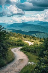 A scenic view of a dirt road winding its way through a lush green valley, perfect for use in travel or nature-related projects