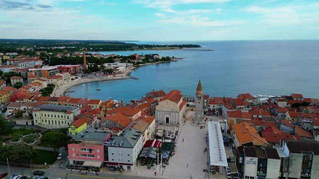 A stunning aerial view of Umag, a charming coastal town in Istria, Croatia. Known for its beautiful beaches, historic architecture, and vibrant marina, Umag offers a perfect blend of relaxation