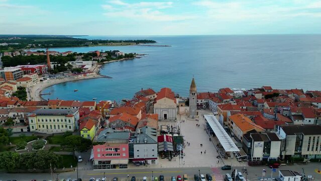 A stunning aerial view of Umag, a charming coastal town in Istria, Croatia. Known for its beautiful beaches, historic architecture, and vibrant marina, Umag offers a perfect blend of relaxation