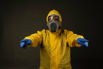 man in a protective suit with a gas mask