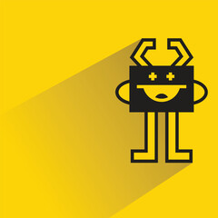cute monster character with drop shadow on yellow background