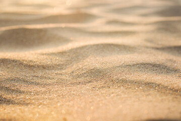 Sand waves background with a narrow stripe in focus