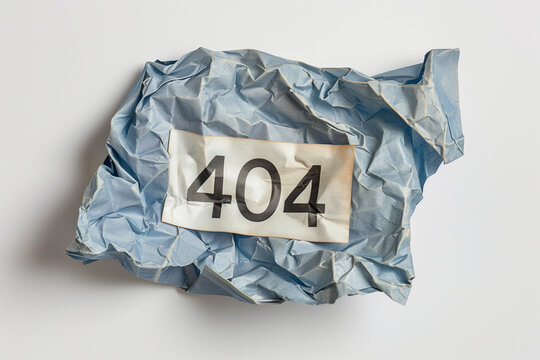 crumpled paper with 404 on it for page not found error message 