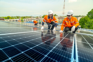 engineer man inspects construction of solar cell panel or photovoltaic cell by electronic device....