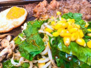 a very delicious mixed beef and chicken teppanyaki dish at a Japanese restaurant