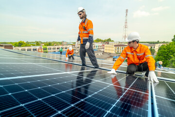 engineer man inspects construction of solar cell panel or photovoltaic cell by electronic device....