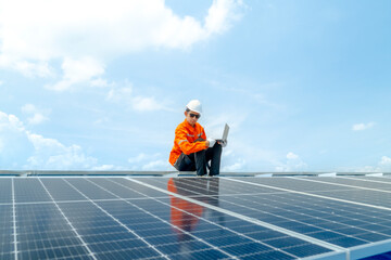 engineer man inspects construction of solar cell panel or photovoltaic cell by electronic device....