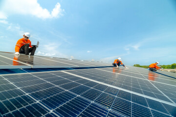 engineer man inspects construction of solar cell panel or photovoltaic cell by electronic device....