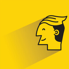 male face icon with shadow on yellow background
