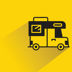 motor home icon with shadow on yellow background