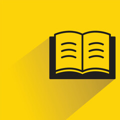 book icon with shadow on yellow background