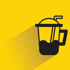 coffee cup with shadow on yellow background