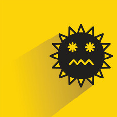 nervous sun emoji with shadow on yellow background