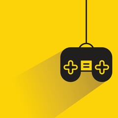 game controller and joystick icon on yellow background