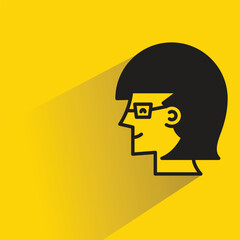 woman face sideview with drop shadow on yellow background