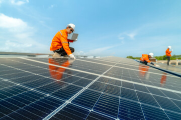 engineer man inspects construction of solar cell panel or photovoltaic cell by electronic device....
