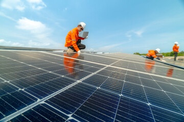 engineer man inspects construction of solar cell panel or photovoltaic cell by electronic device....