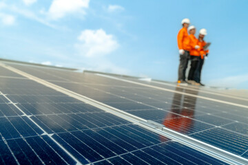 engineer man inspects construction of solar cell panel or photovoltaic cell by electronic device. Industrial Renewable energy of green power. factory worker working on tower roof.