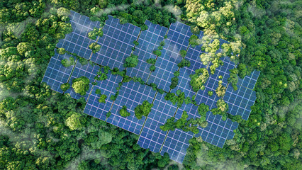 Solar panels installed in the green forest Clean alternative energy concept. Environment, solar...