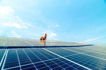engineer man inspects construction of solar cell panel or photovoltaic cell by electronic device....