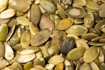 Peeled pumpkin seeds, kernels close-up