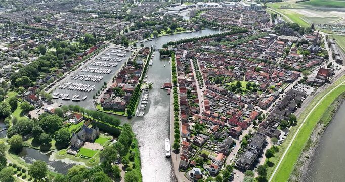Drone view of Medemblik Marina by the Ijsselmeer surrounded by greenery in the Netherlands