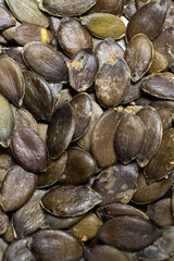 Peeled pumpkin seeds, kernels close-up
