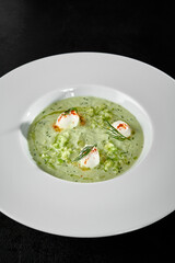 Refreshing Cucumber Gazpacho Soup with Mozzarella Balls in White Bowl