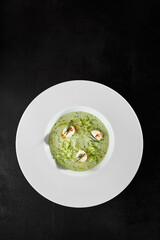 Elegant Cucumber Gazpacho with Mozzarella Cheese on Black Background – Gourmet Dish Stock Photo