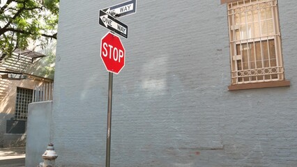 New York City oneway crossroad, Minetta street intersection one way arrow. Manhattan Greenwich...