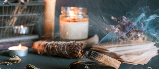 Tarot, astrology,Esoteric, Occult mystical ritual scene of sorcery tarot candles,dried flowers, palo santo tarot cards, ritual book.Witchcraft,mysticism and occultism,esoteric background,tarot banner