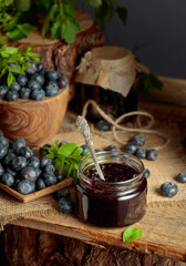 Blueberry jam with fresh berries.