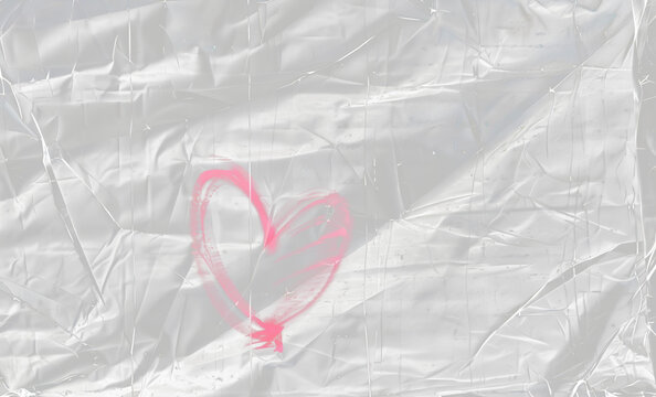 red transparent plastic film overlay texture background with a heart