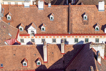 Old tiled roofs with dormer windows in Vienna