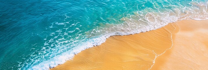 A panoramic aerial photograph showcasing a breathtaking coastal beach with crystal-clear turquoise water gently lapping against soft, white and yellow sands