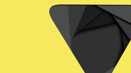 A folded black triangle made of paper or cardboard with a yellow background. The triangle is outlined in black and the yellow background is folded to match the shape - Powered by Adobe