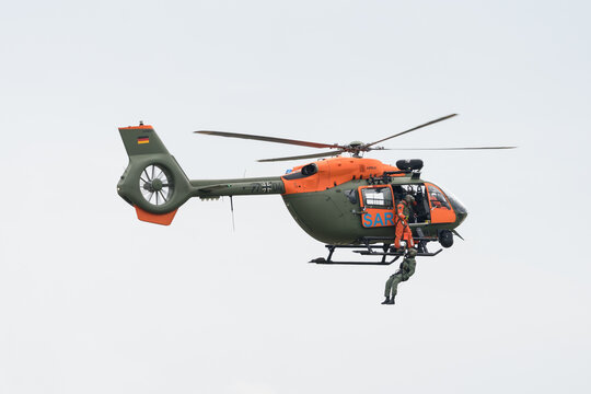 BERLIN - JUNE 05, 2024: The demonstration flight of light utility helicopter Airbus H145 SAR (Search and Rescue) by German Army. ILA Berlin Air Show 2024.