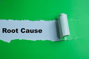 Concept of Root Cause Text written in torn paper.