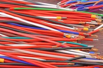 Copper stranded mounting electrical wires in colored insulation for electrical equipment. Close-up. Soft focus.