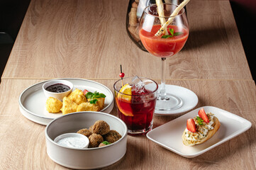 cocktail snacks. an aperitif for cocktails. cocktail bar menu