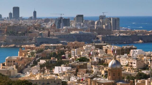 Drone view of maltese buildings, constructions, architecture, towers, city. Maltese island